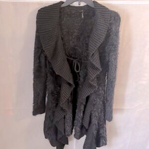 Lapis Black furry sweater with a symmetrical hem